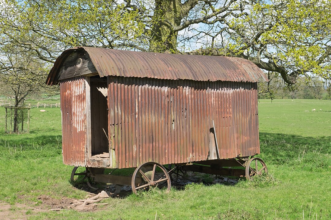 old rusted corrugated metal shepherds hut