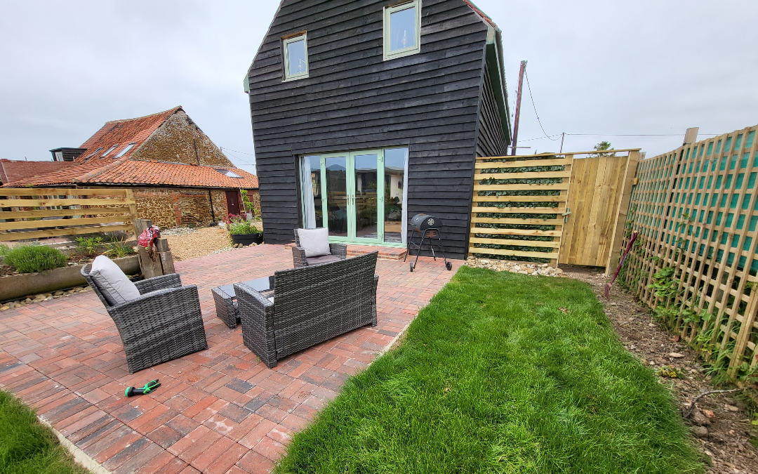 Norfolk Coastal Cottages, The Diary has a large private garden with patio, seating and a firepit to enjoy evenings watching the sunset