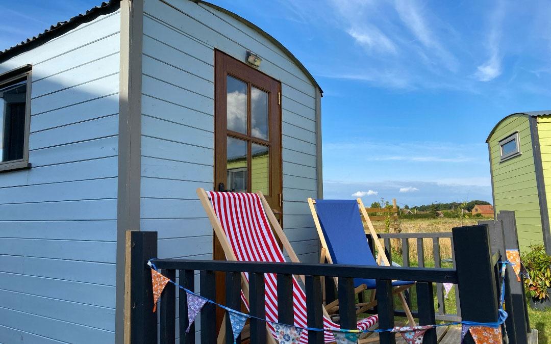 outside view of our glamping shepherds huts at west of wells camping & glamping