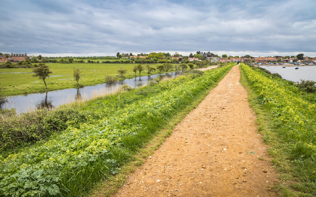 Walk from the harbour to the beach along the winding route of burnham overy staithe