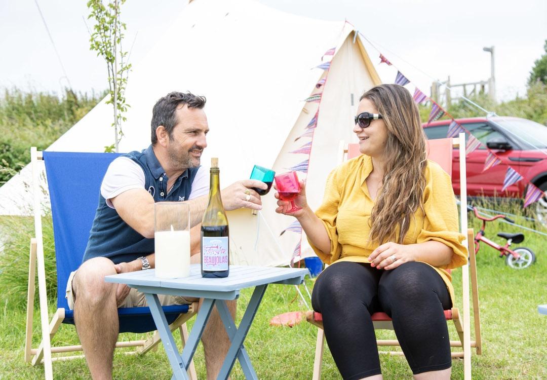 Norfolk Camping Holidays Glamping Couple Drinking Wine