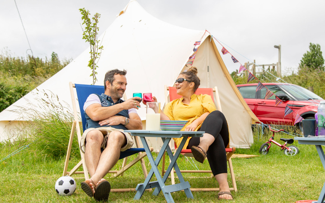 Enjoy a glass or two outside your glamping bell tent here at Hunstanton Glamping