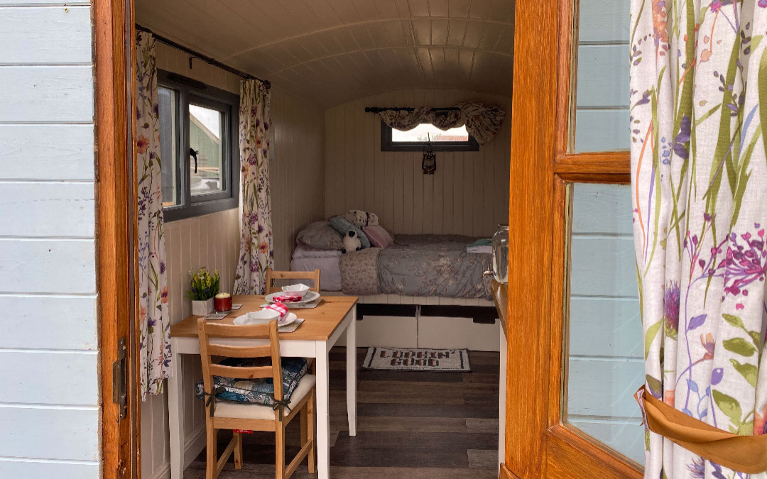 an inside look at our glamping shepherds huts here at norfolk coast path glamping