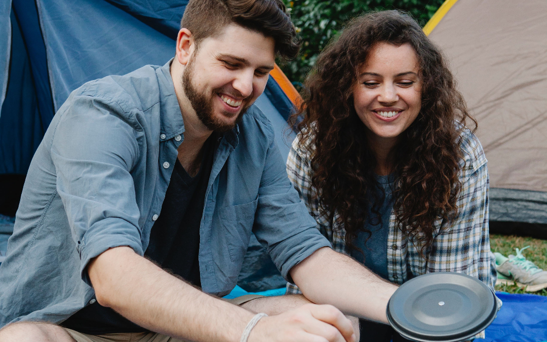 couple cooking in nature