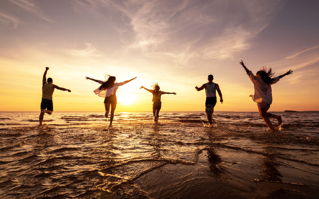 friends running into sea