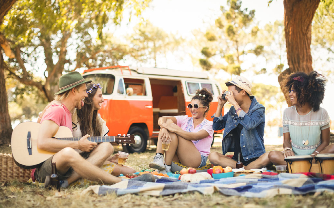 group of friends having fun picnic