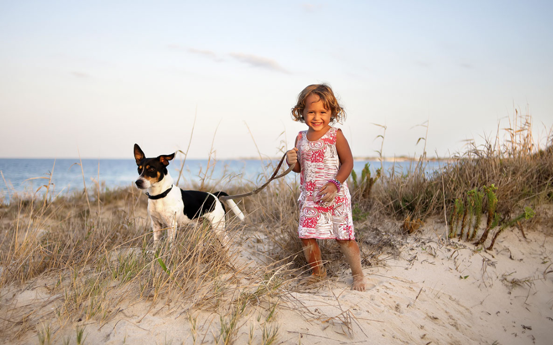 young girl with dog