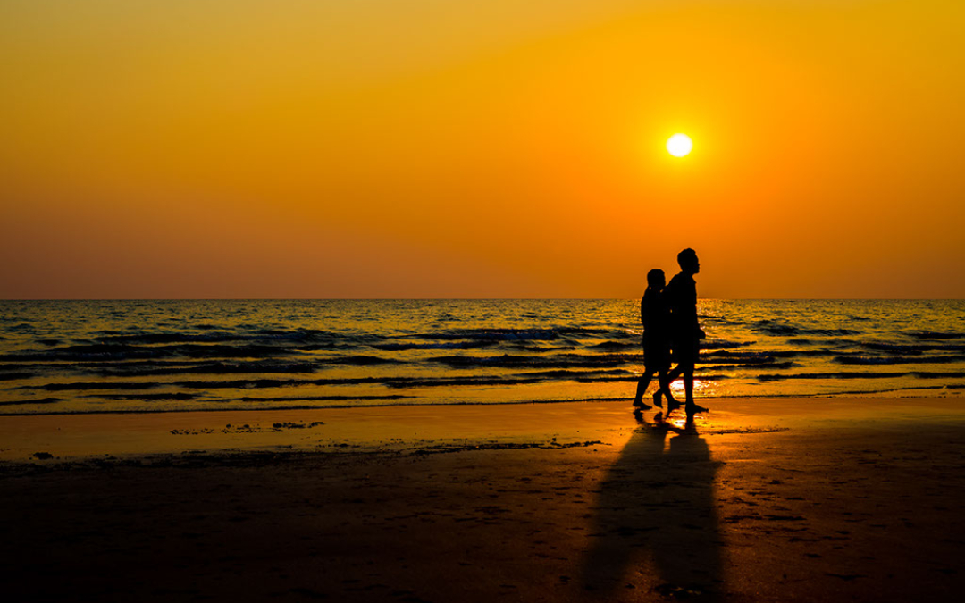 romantic couple beach sunset