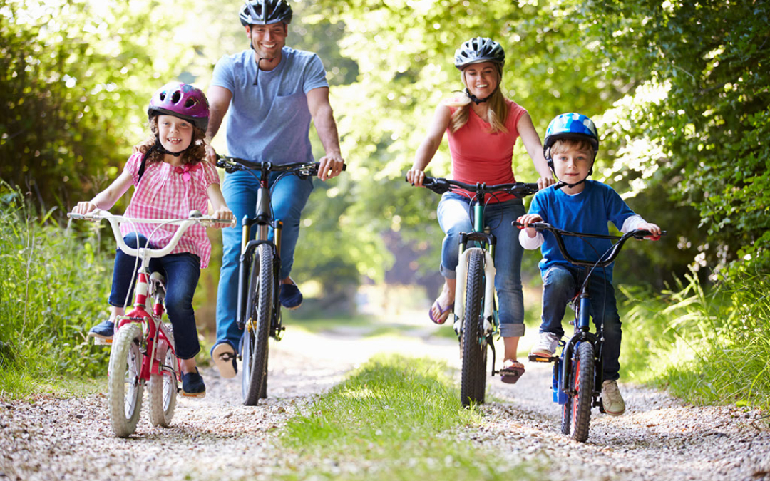 family going cycling