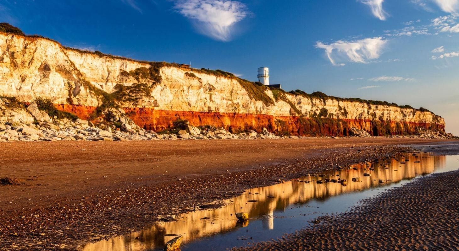 old hunstanton cliffs in the evening with the sunset shining on them