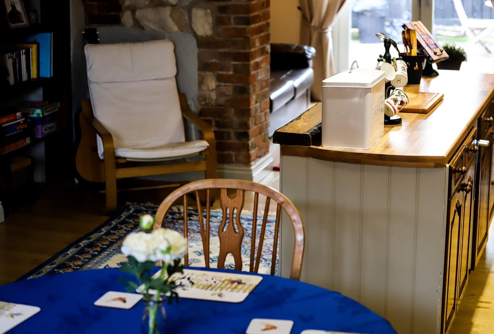 table and chair in an open plan cottage
