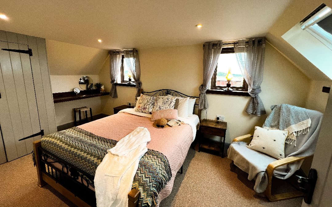 a double bed for parents in a self-catering cottage