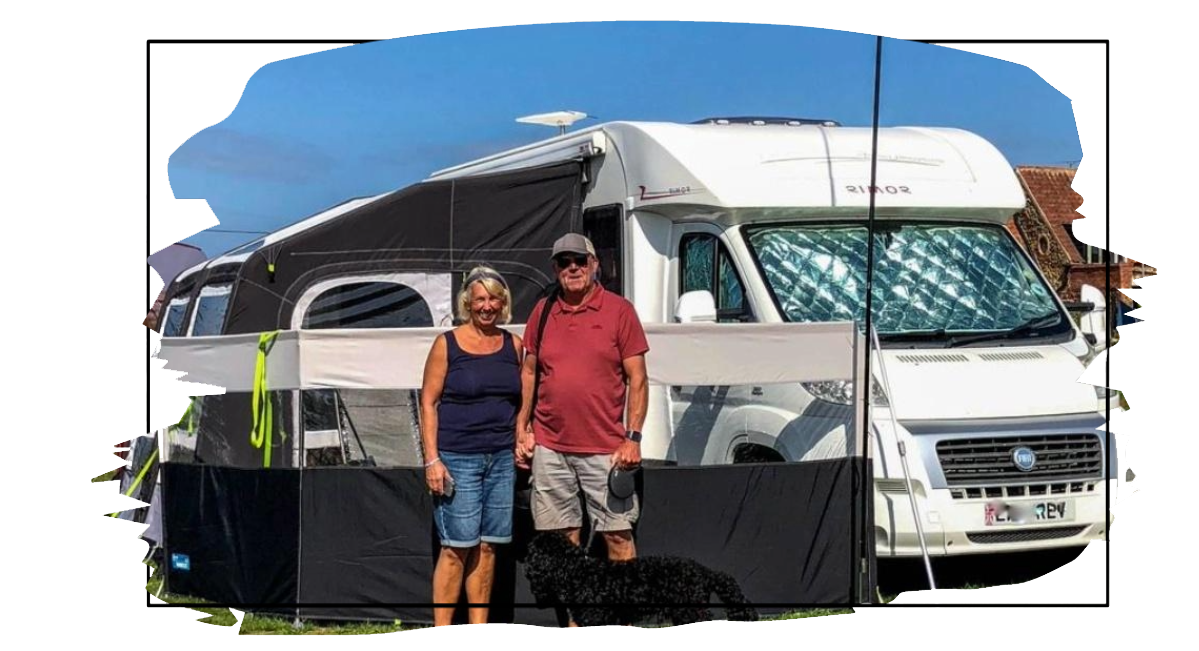 couple visiting the norfolk coast in their motorhome